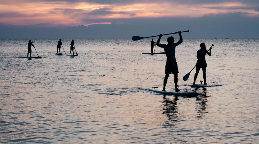 People on SUPs out on the sea